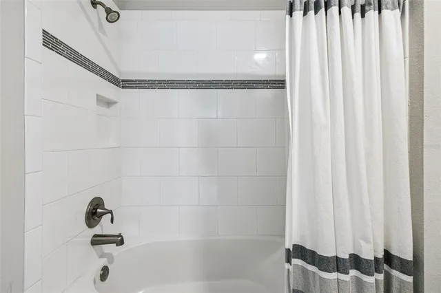 a bathroom with a sink vanity and a mirror