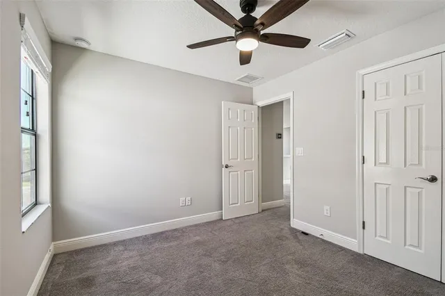 a view of a back yard from a balcony