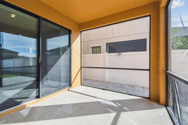 an aerial view of a house with outdoor space patio and swimming pool