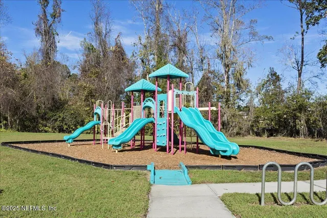 a small view of a park with slide