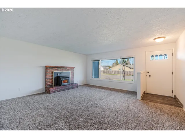 a view of empty room with front door