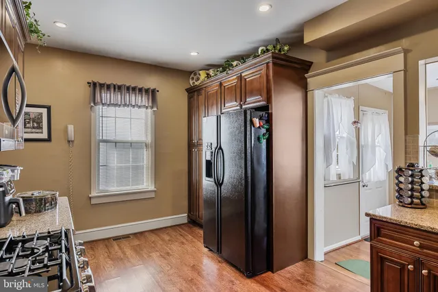 a view of livingroom with furniture and front door