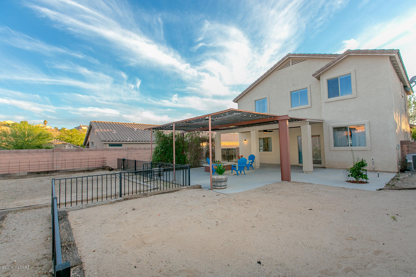 39103 Winners Circle Tucson, AZ 85739 - Photo 18 of 19 a view of a house with backyard and porch