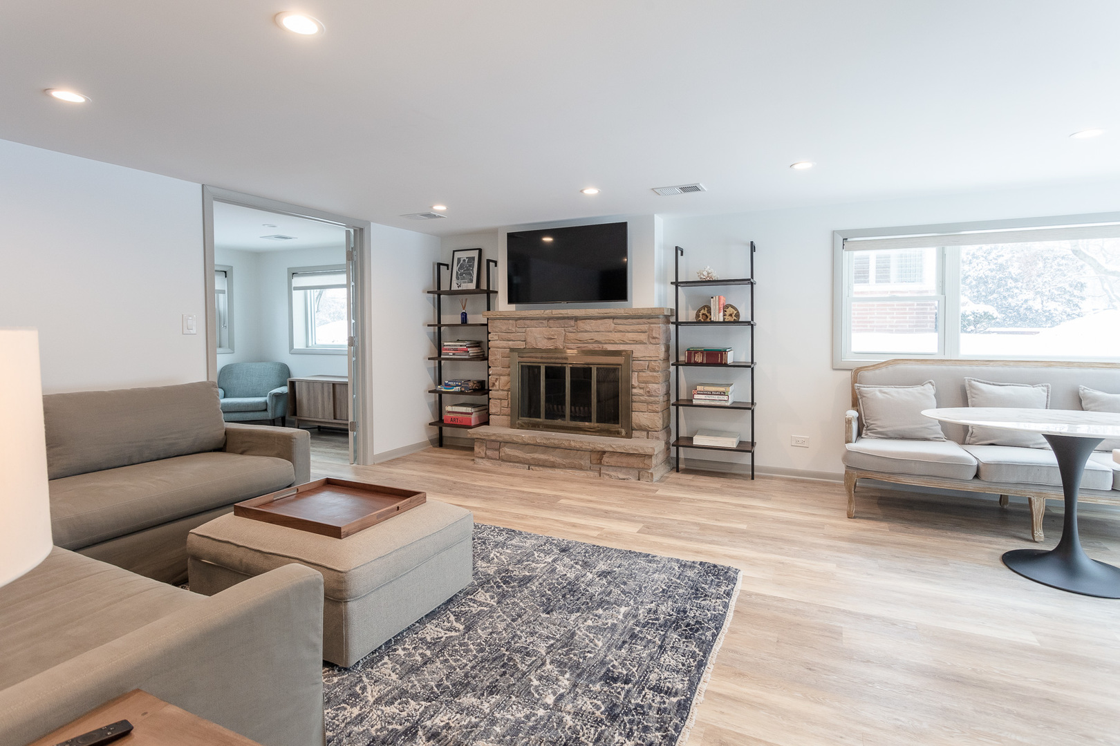 1215 Hillside Road Northbrook, IL 60062 - Photo 8 of 11 a living room with furniture and a flat screen tv