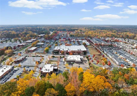 an aerial view of residential building with parking space