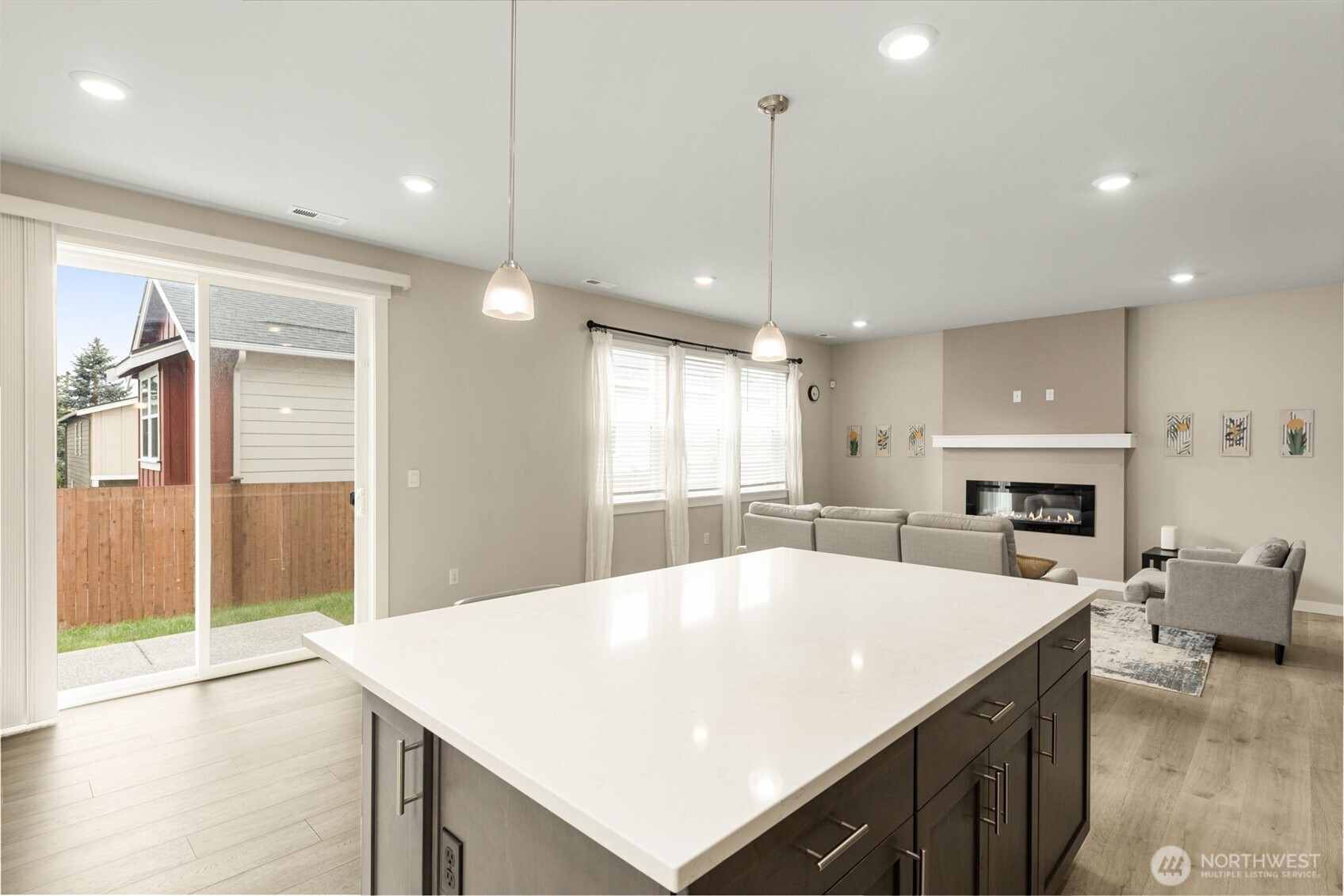 19410 28th Drive Southeast Bothell, WA 98012 - Photo 18 of 37 a large kitchen with sink a refrigerator and chairs