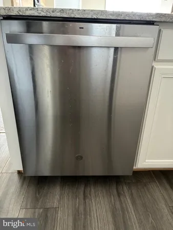 a view of a refrigerator in a kitchen