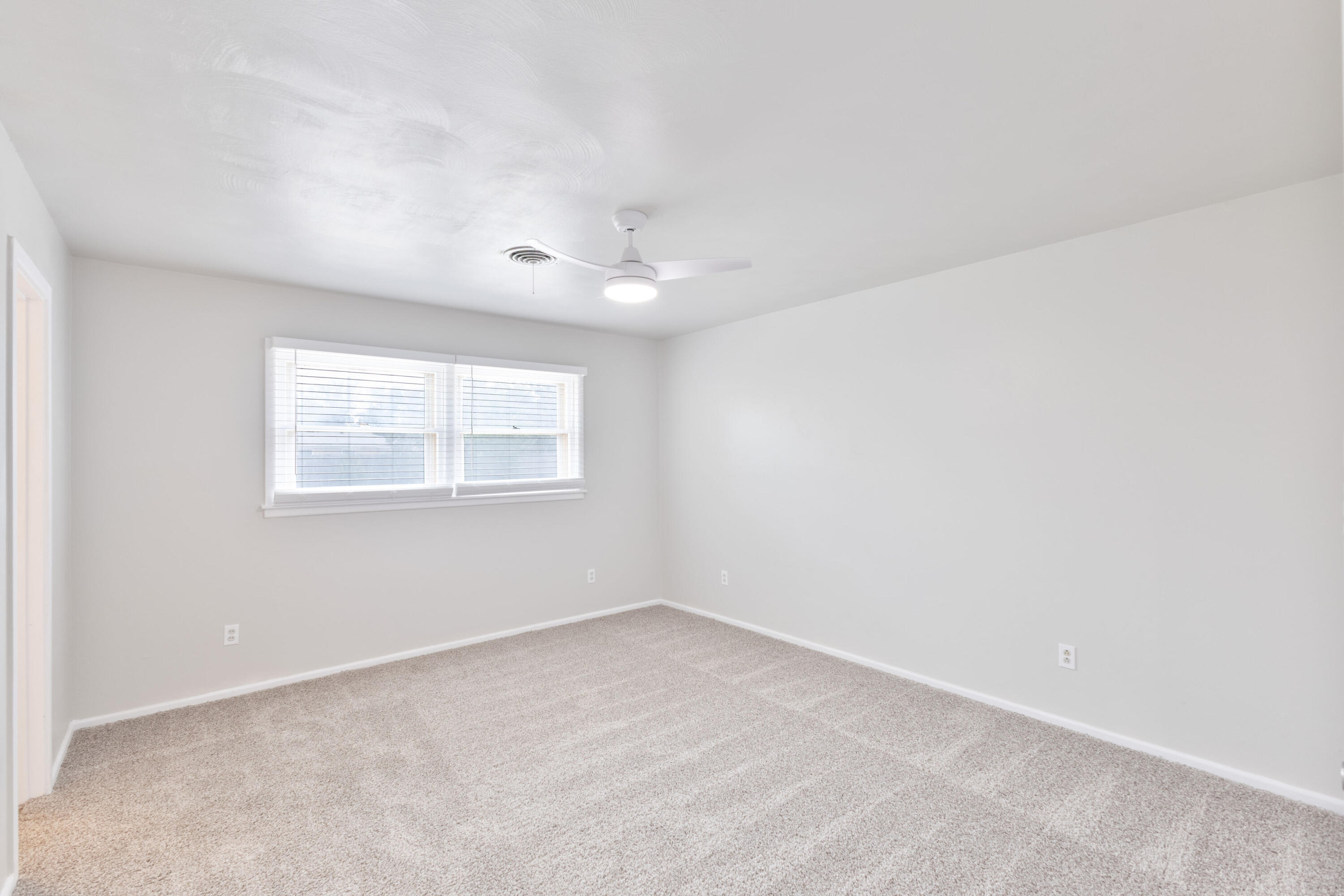 3417 52nd Street Lubbock, TX 79413 - Photo 16 of 19 an empty room with a window