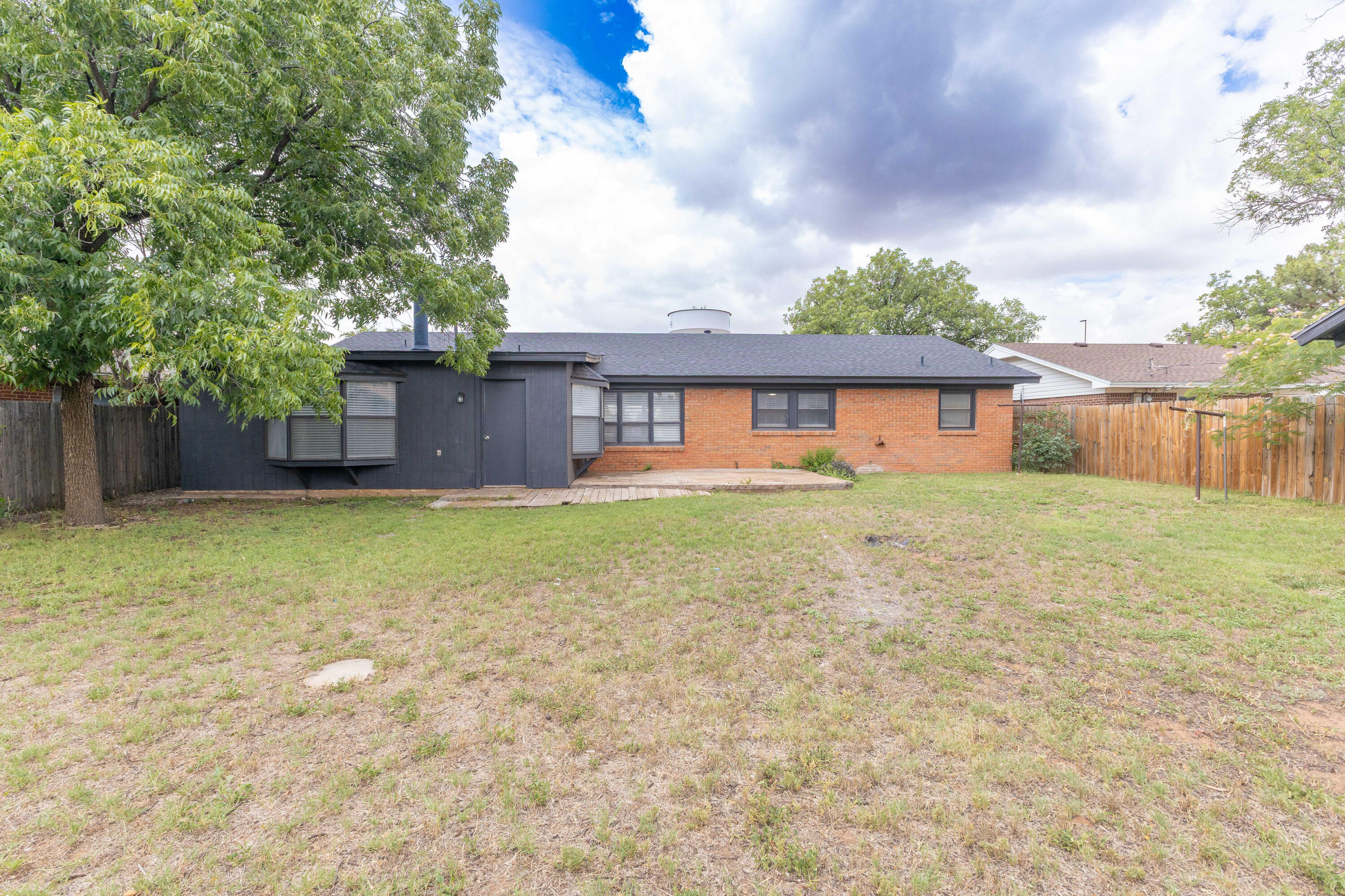 3417 52nd Street Lubbock, TX 79413 - Photo 18 of 19 front view of a house with a yard
