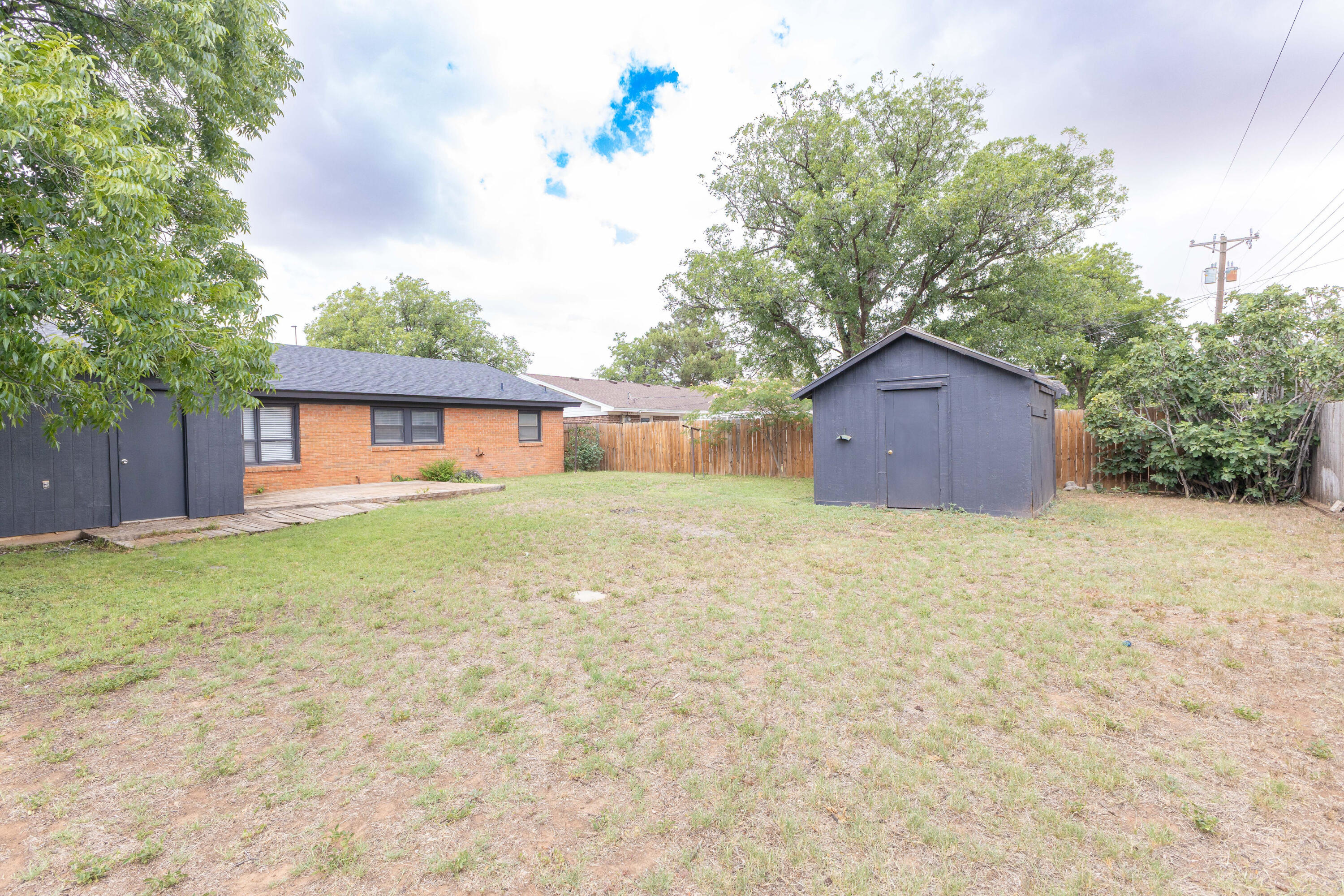 3417 52nd Street Lubbock, TX 79413 - Photo 19 of 19 a house view with a garden space