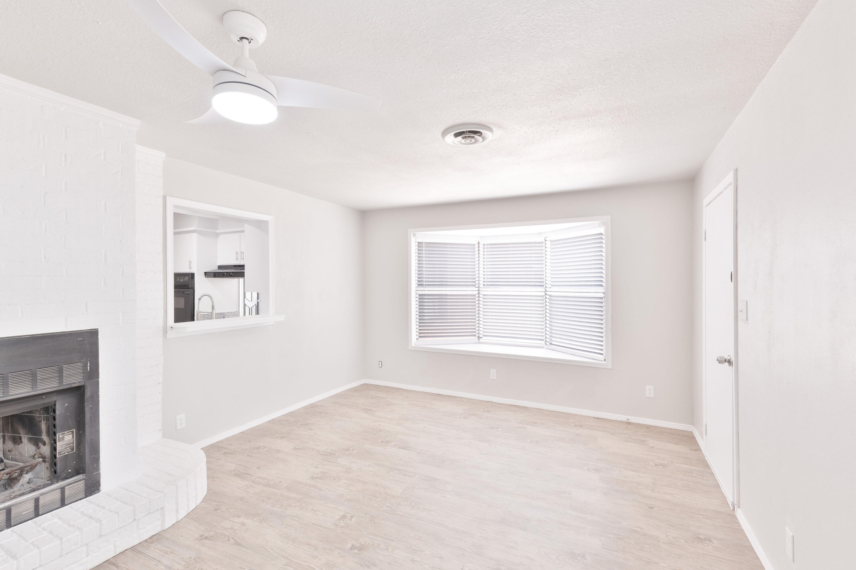 3417 52nd Street Lubbock, TX 79413 - Photo 10 of 19 a view of an empty room with a window