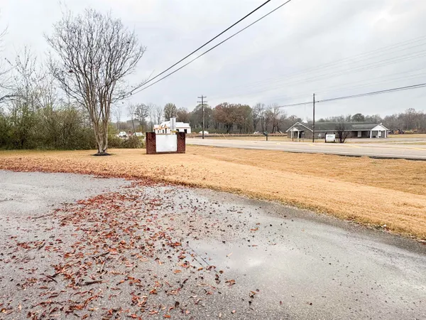 a view of parking garage with cars