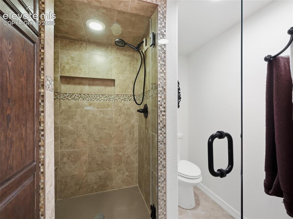 12855 Murphy Road Elbert, CO 80106 - Photo 31 of 50 a bathroom with a shower