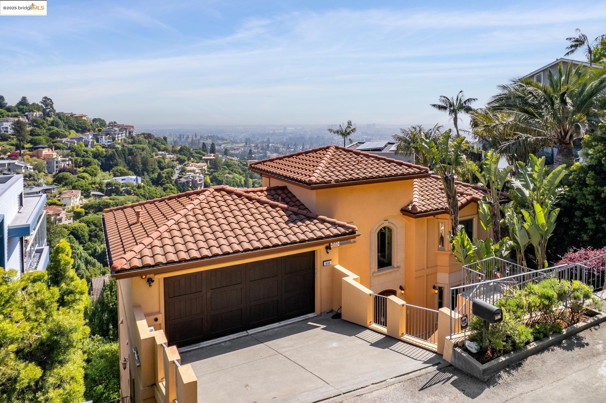 530 Gravatt Drive Berkeley, CA 94705 - Photo 1 of 1 an aerial view of a residential apartment building with a yard