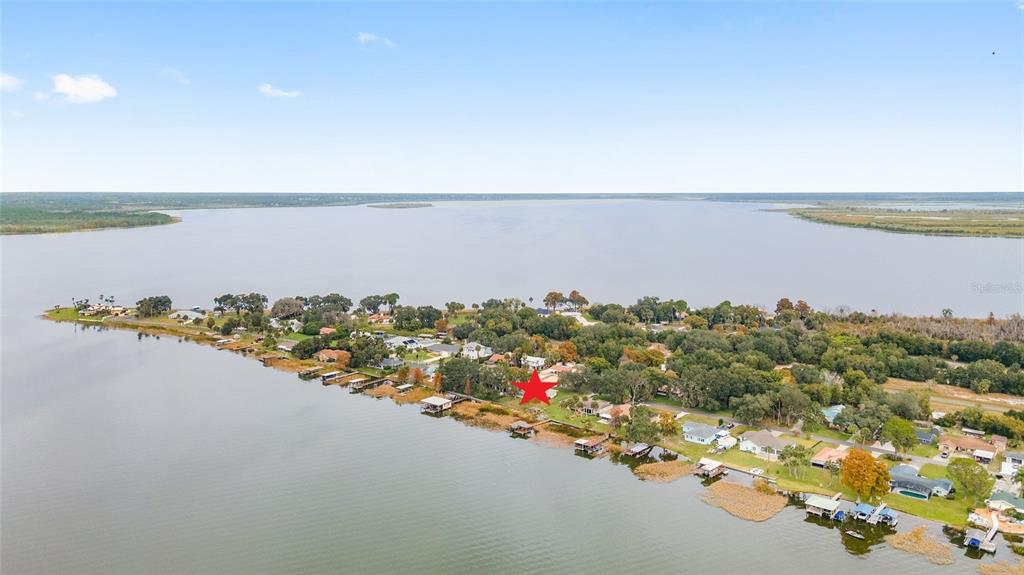 7124 Treasure Island Road Leesburg, FL 34788 - Photo 1 of 1 AERIAL View - 7124 Treasure Island Road, Leesburg, FL 34788. Located in TREASURE ISLAND SHORES subdivision on LAKE GRIFFIN - HARRIS CHAIN OF LAKES