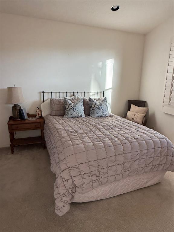 6710 Vía Roma Delray Beach, FL 33446 - Photo 14 of 35 a bedroom with a bed and a couch