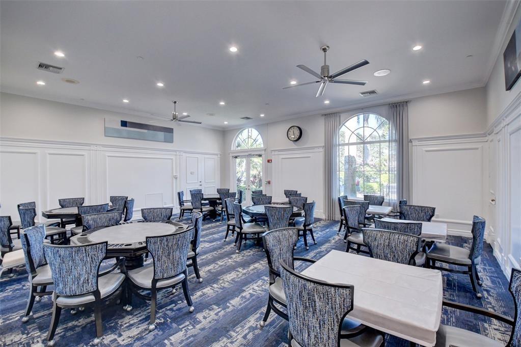 6710 Vía Roma Delray Beach, FL 33446 - Photo 29 of 35 a view of a dining room with furniture