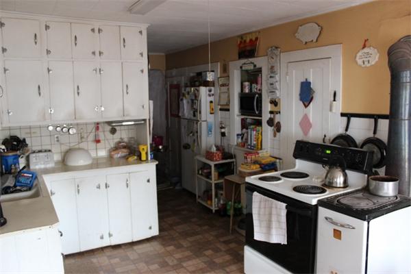 91 Foundry Village Road Colrain, MA 01340 - Photo 5 of 10 a kitchen with stainless steel appliances granite countertop a stove and a sink