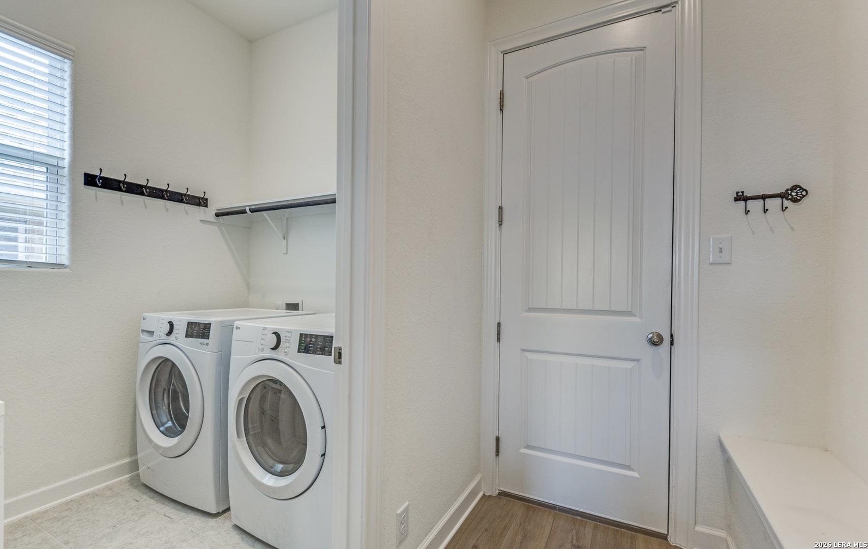 390 Rhapsody View Spring Branch, TX 78070 - Photo 14 of 28 a utility room with dryer and washer