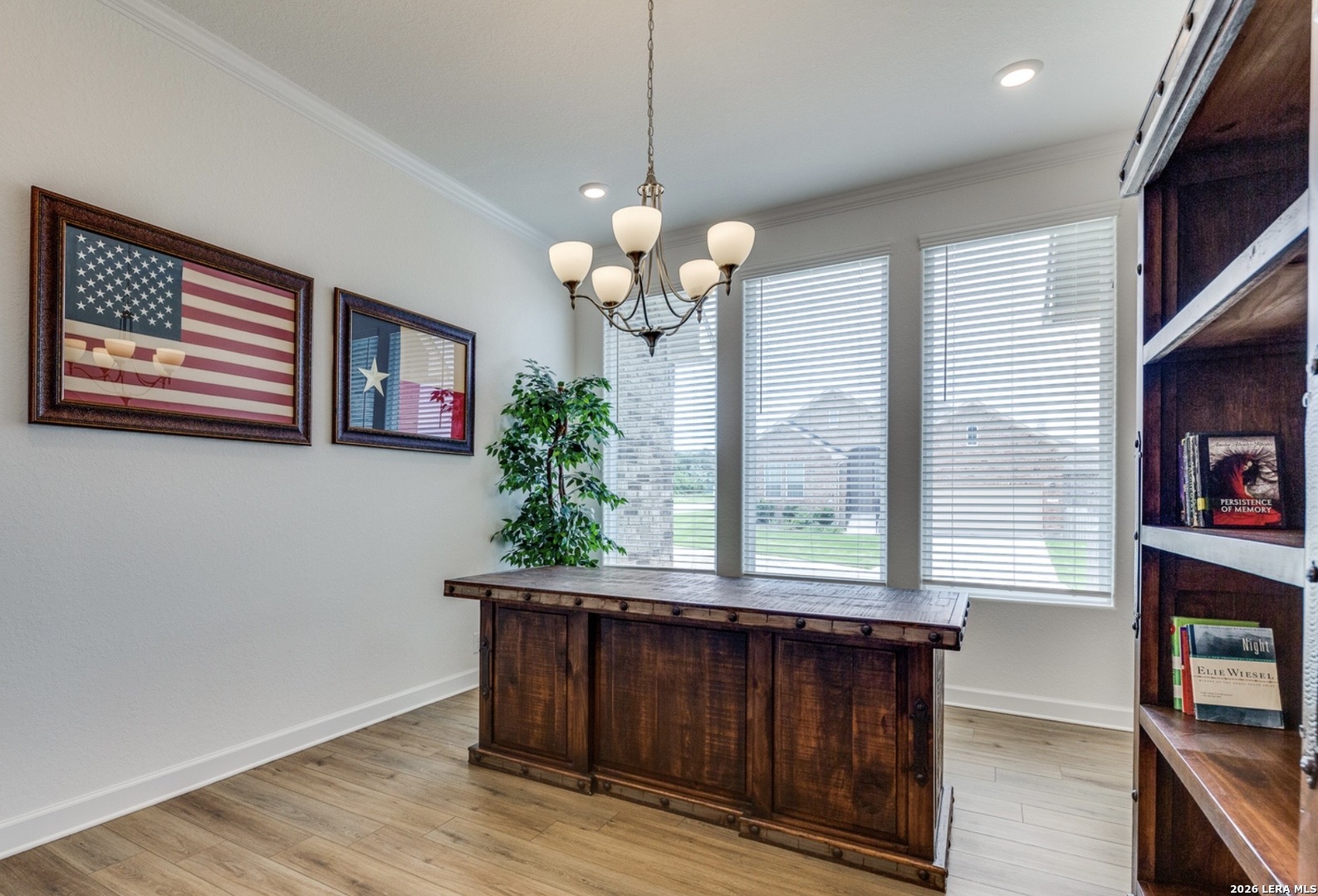 390 Rhapsody View Spring Branch, TX 78070 - Photo 15 of 28 a view of a dining room with furniture window and wooden floor