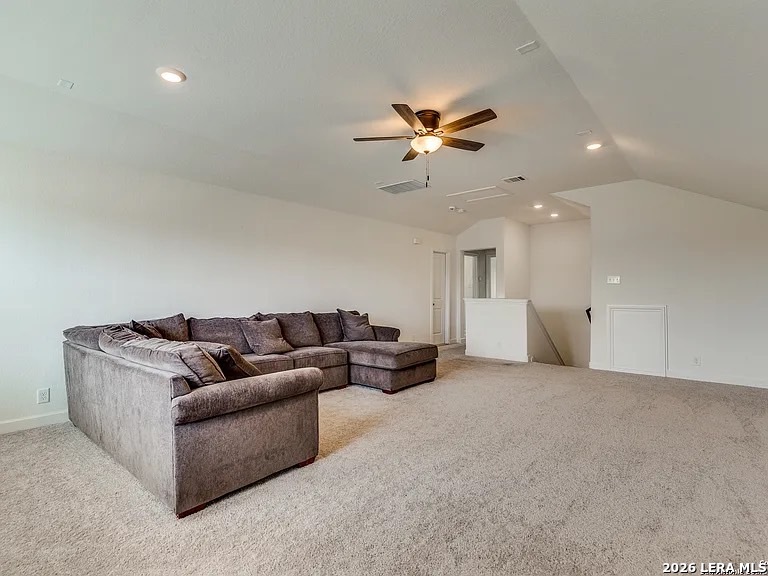 390 Rhapsody View Spring Branch, TX 78070 - Photo 26 of 28 a living room with furniture and a ceiling fan