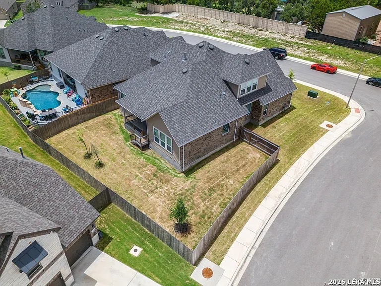 390 Rhapsody View Spring Branch, TX 78070 - Photo 7 of 28 an aerial view of residential houses with outdoor space