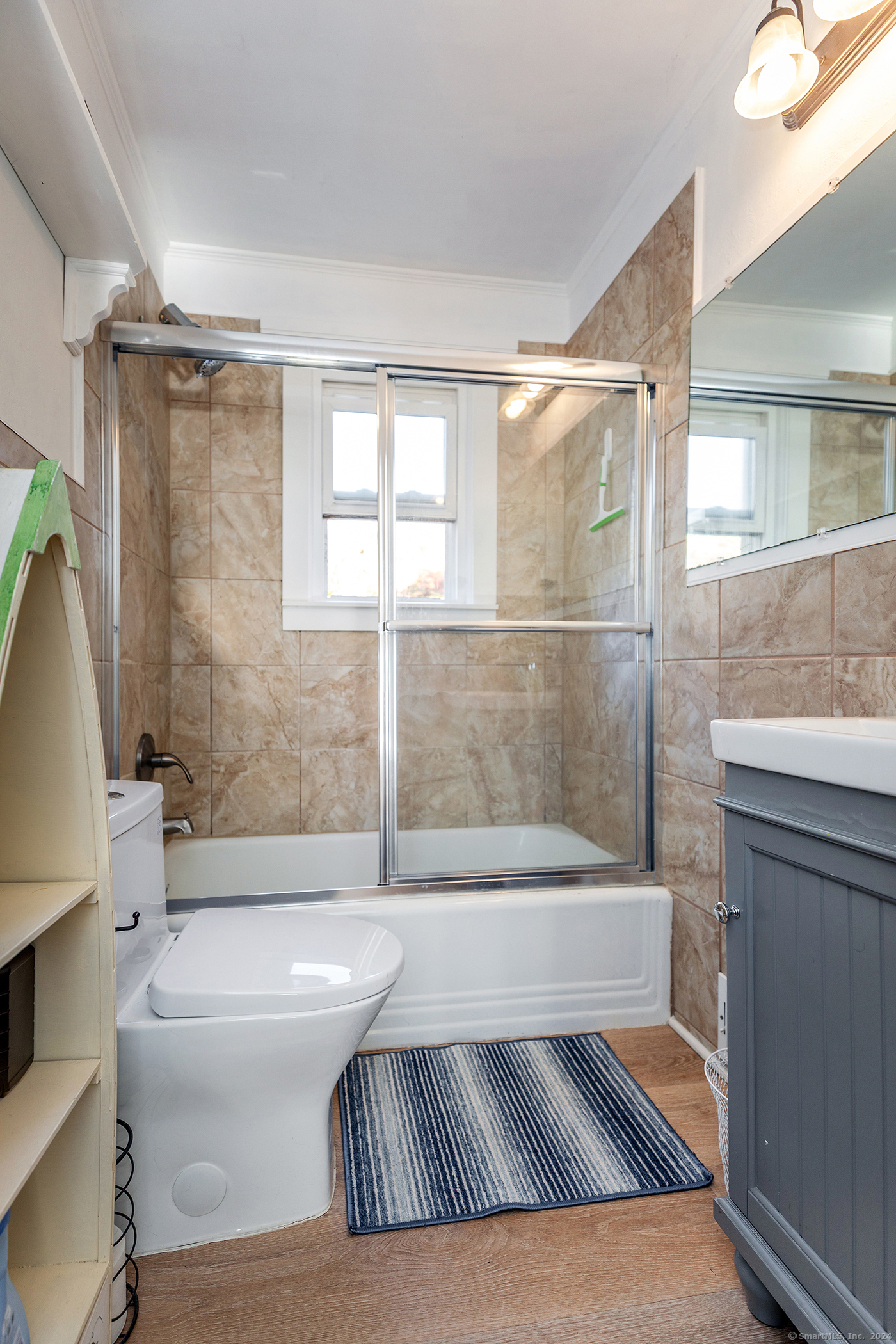 5 Windmill Road New Fairfield, CT 06812 - Photo 24 of 37 a bathroom with a bathtub and a shower
