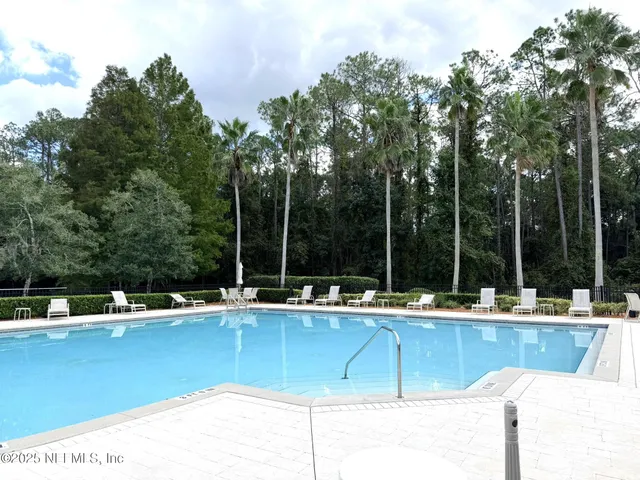 a view of a house with a swimming pool