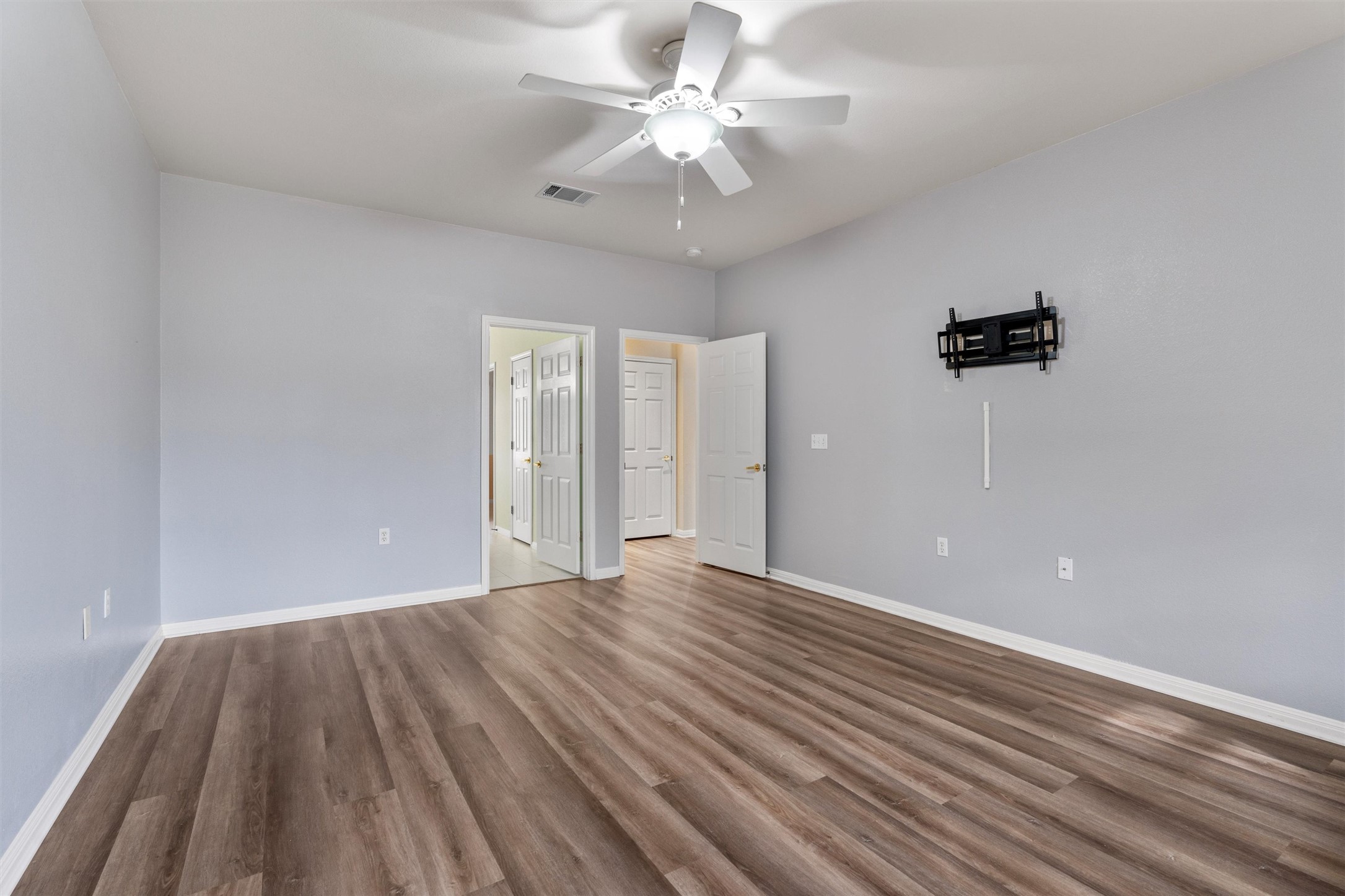 122 Nolan Drive Georgetown, TX 78633 - Photo 18 of 35 wooden floor in an empty room with a window