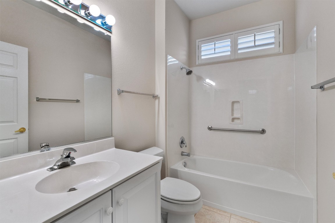 122 Nolan Drive Georgetown, TX 78633 - Photo 24 of 35 a bathroom with a sink toilet tub and shower