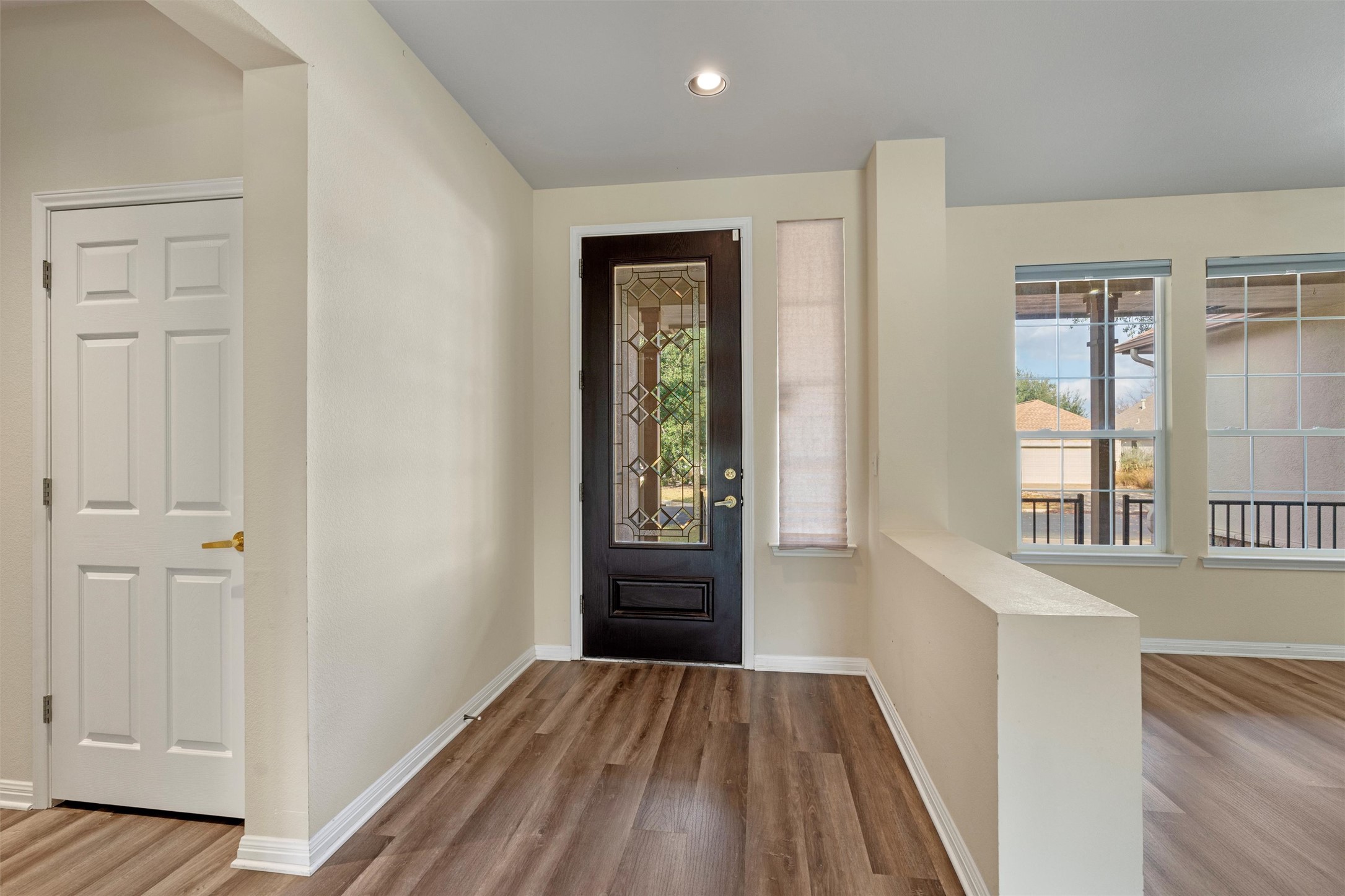122 Nolan Drive Georgetown, TX 78633 - Photo 3 of 35 wooden floor in an empty room with a window