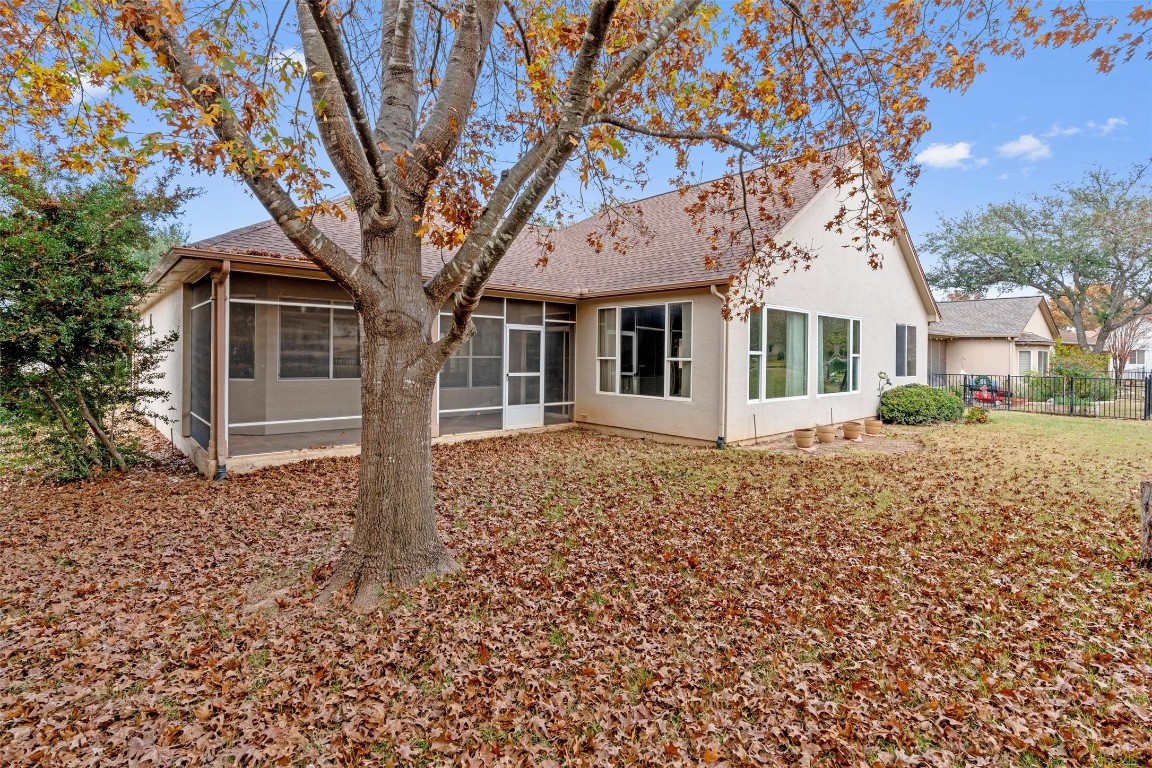 122 Nolan Drive Georgetown, TX 78633 - Photo 32 of 35 a front view of a house with garden