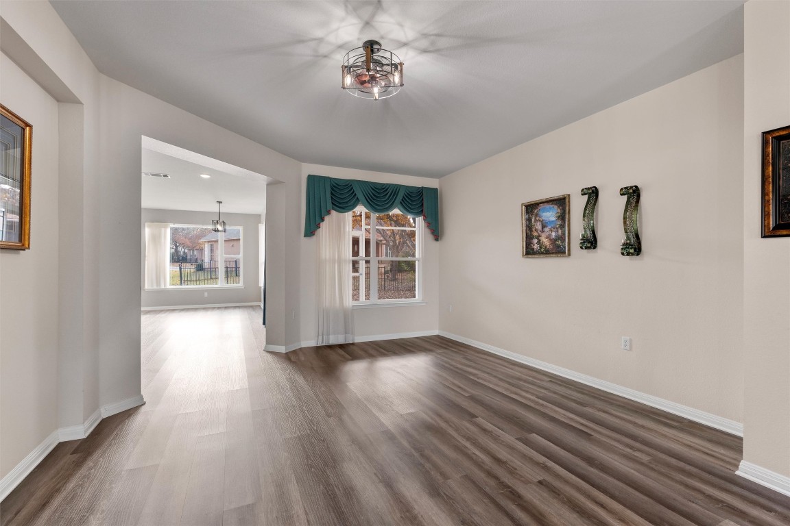 122 Nolan Drive Georgetown, TX 78633 - Photo 6 of 35 a view of livingroom with furniture wooden floor and window