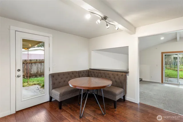 a room with furniture and a wooden floor