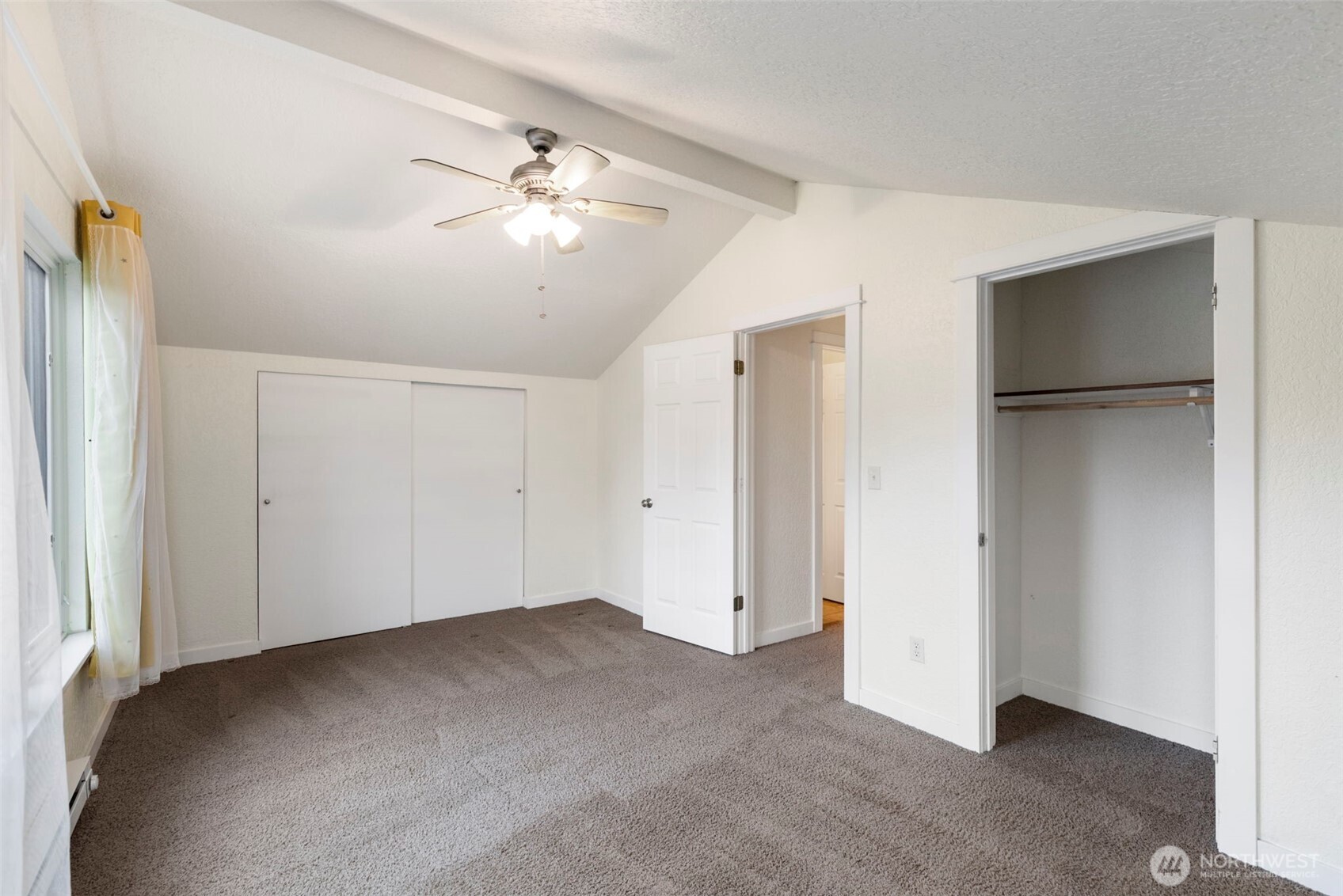 101 D Street Port Hadlock, WA 98339 - Photo 20 of 36 a view of a big room with chandelier fan and a chandelier fan