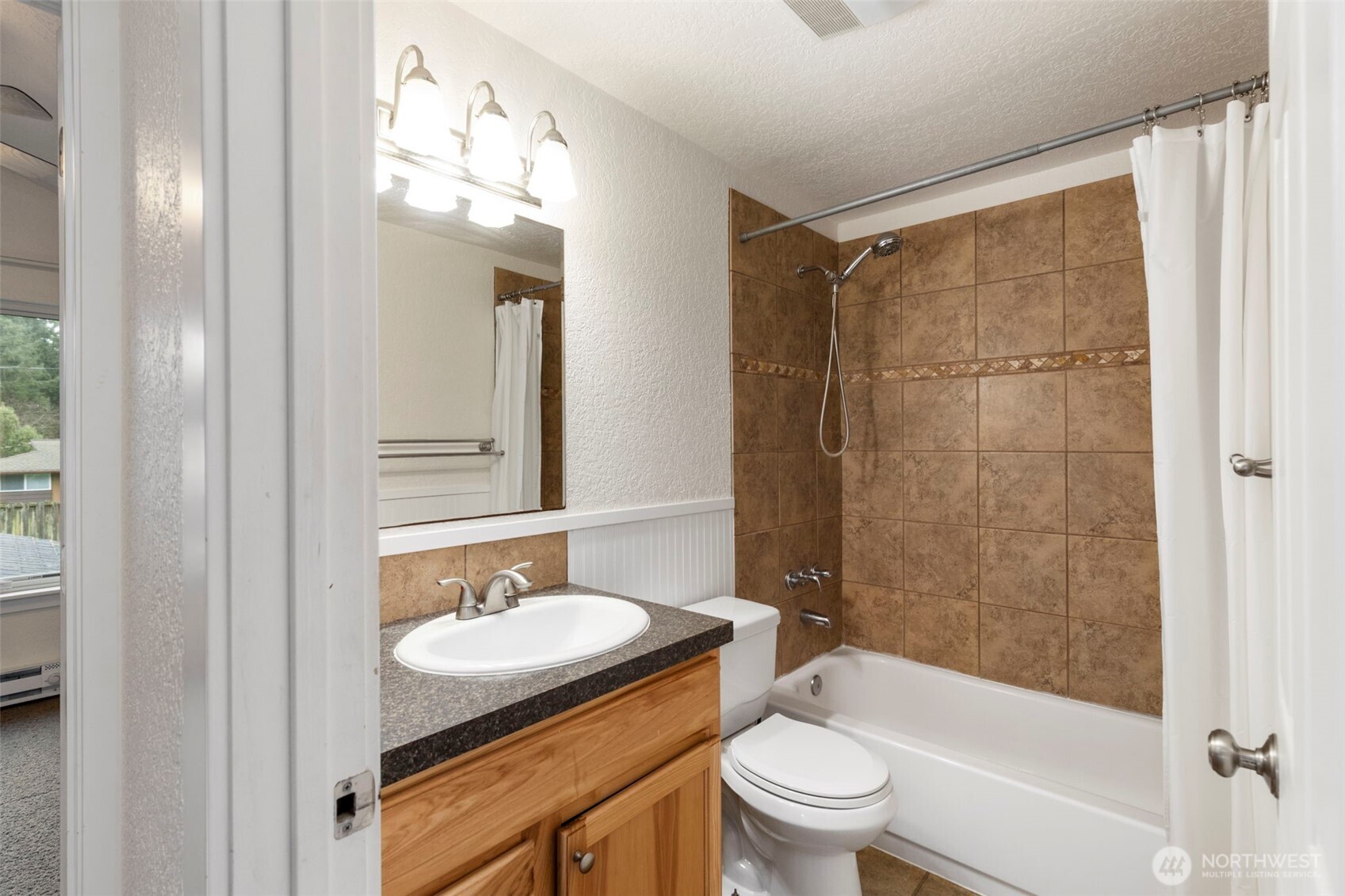 101 D Street Port Hadlock, WA 98339 - Photo 21 of 36 a bathroom with a sink granite toilet and shower