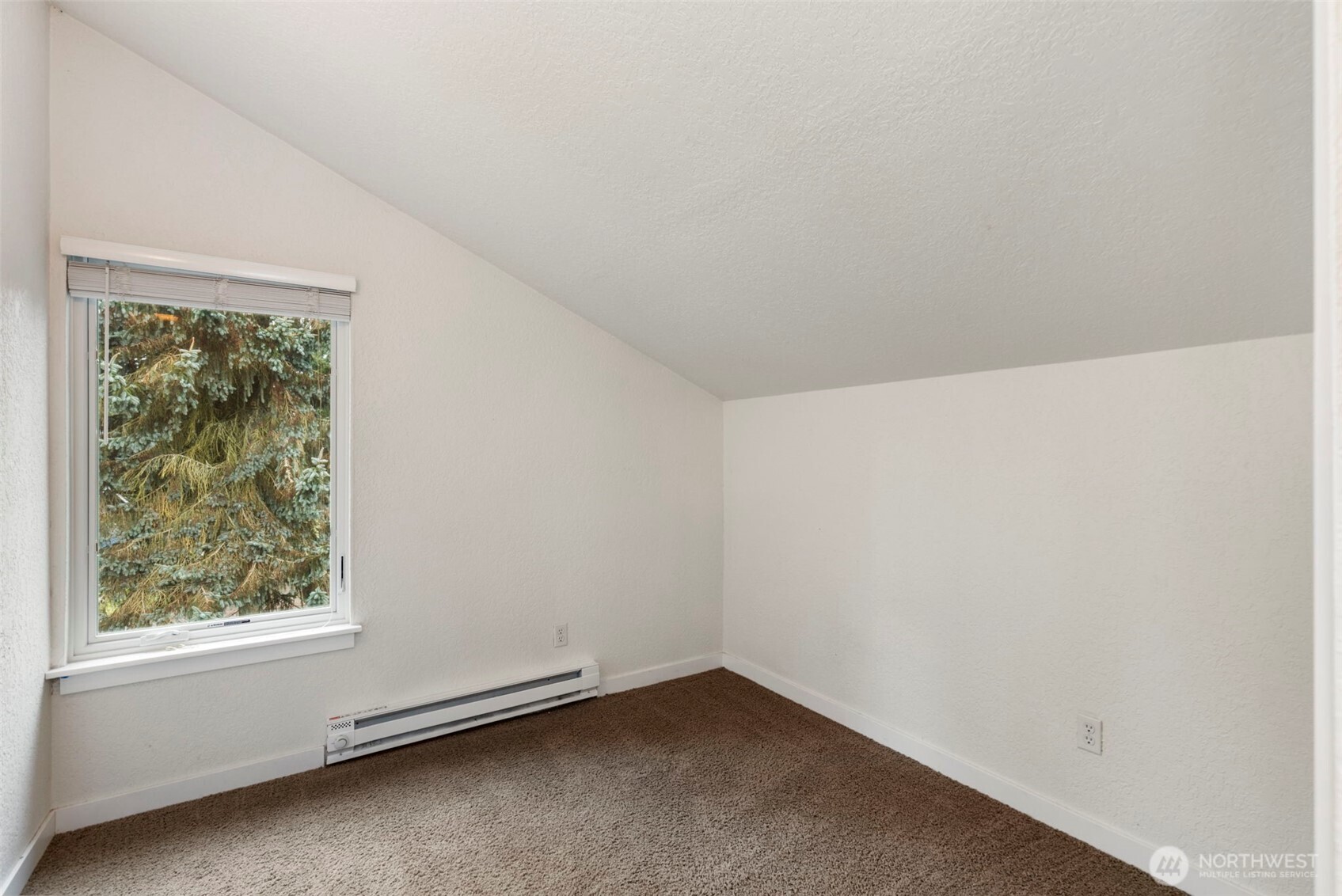101 D Street Port Hadlock, WA 98339 - Photo 23 of 36 an empty room with a window