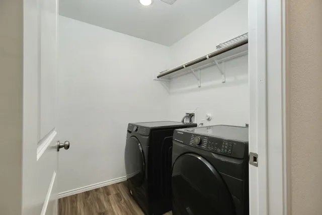 a utility room with dryer and washer