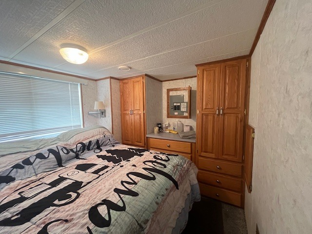 2795 East 28th Road Marseilles, IL 61341 - Photo 13 of 23 a bedroom with a bed and a mirror