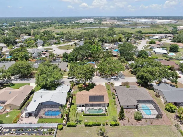 an aerial view of a city with lots of residential buildings