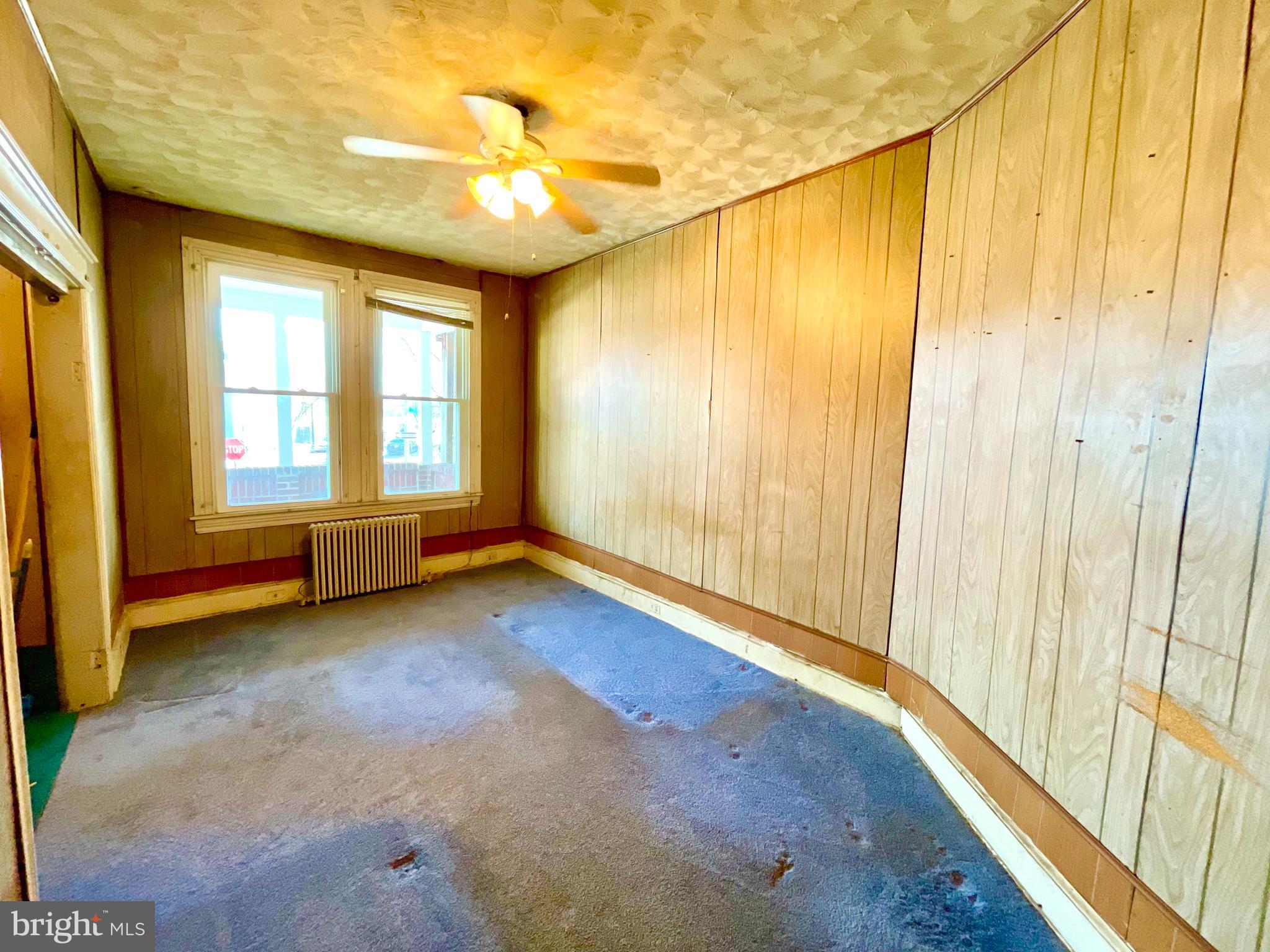 1646 Trinidad Avenue Northeast Washington, DC 20002 - Photo 6 of 10 a view of a big room with wooden floor and windows