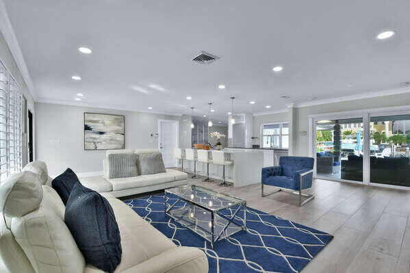 839 Enfield Street Boca Raton, FL 33487 - Photo 33 of 36 a living room with furniture and a large window