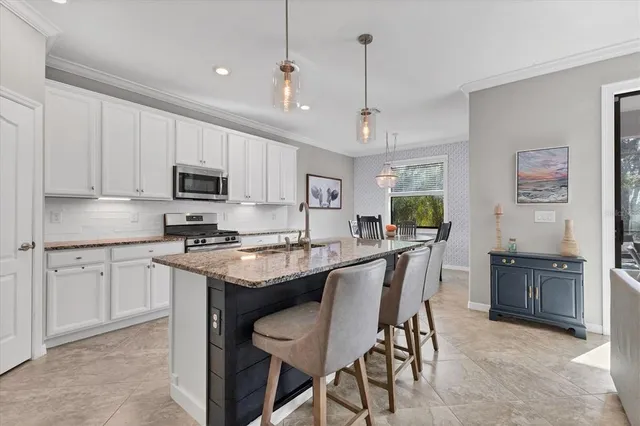 a view of a dining room with furniture window and outside view