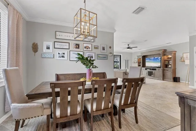 a bathroom with a granite countertop double vanity sink and a mirror