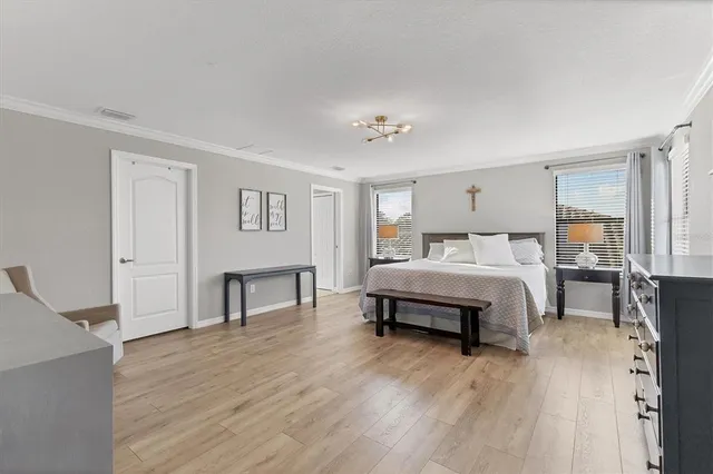 a view of a livingroom with furniture and a ceiling fan