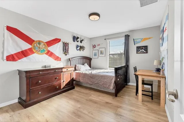 a kitchen with stainless steel appliances granite countertop a stove top oven a refrigerator a sink and dishwasher