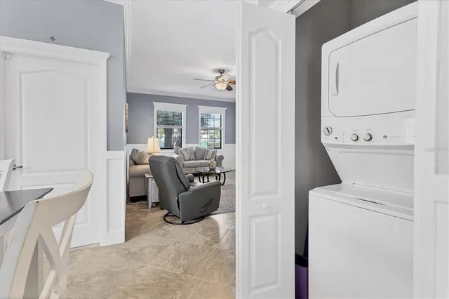 a view of a livingroom with furniture and a flat screen tv