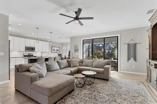 a view of a dining room with furniture window and outside view