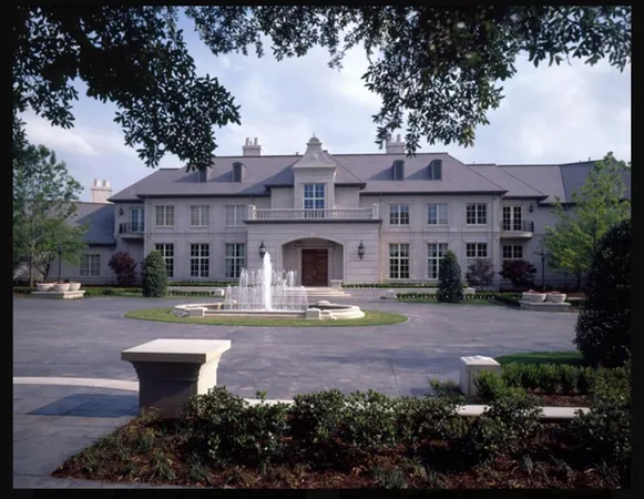 a front view of a house with sitting space