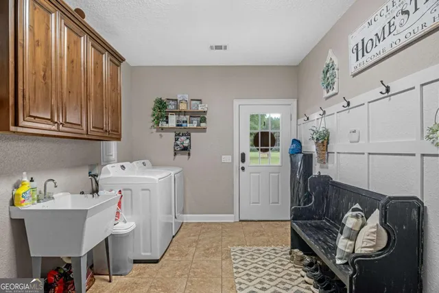 a living room with furniture and a table